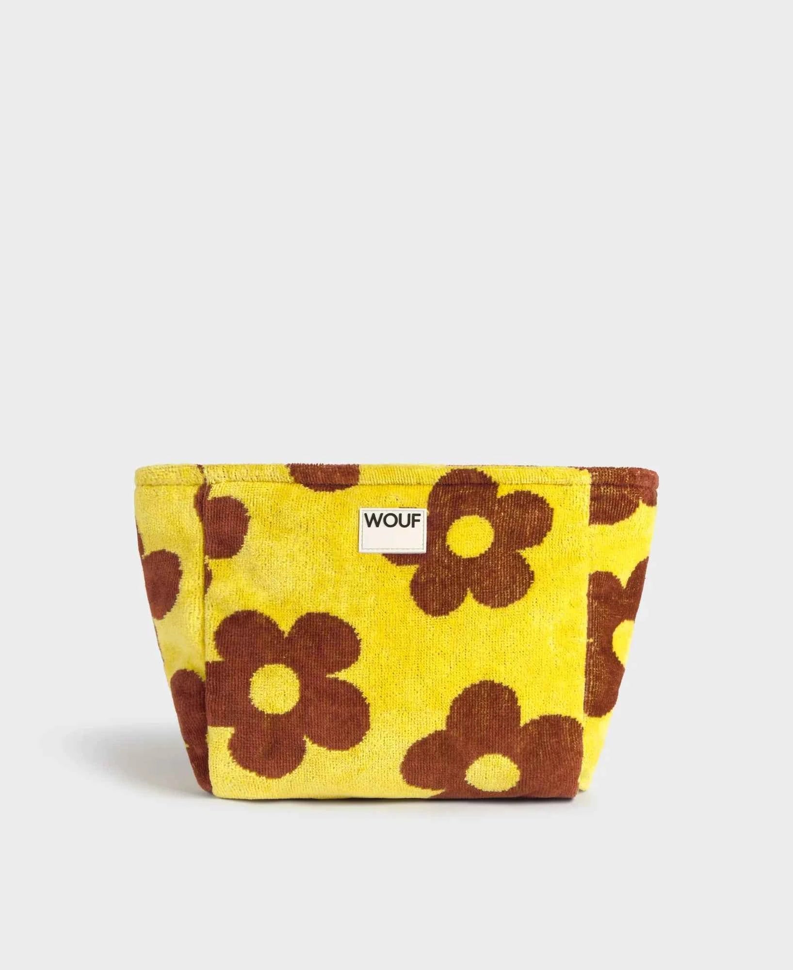 Yellow fabric pouch with brown floral patterns on a white background