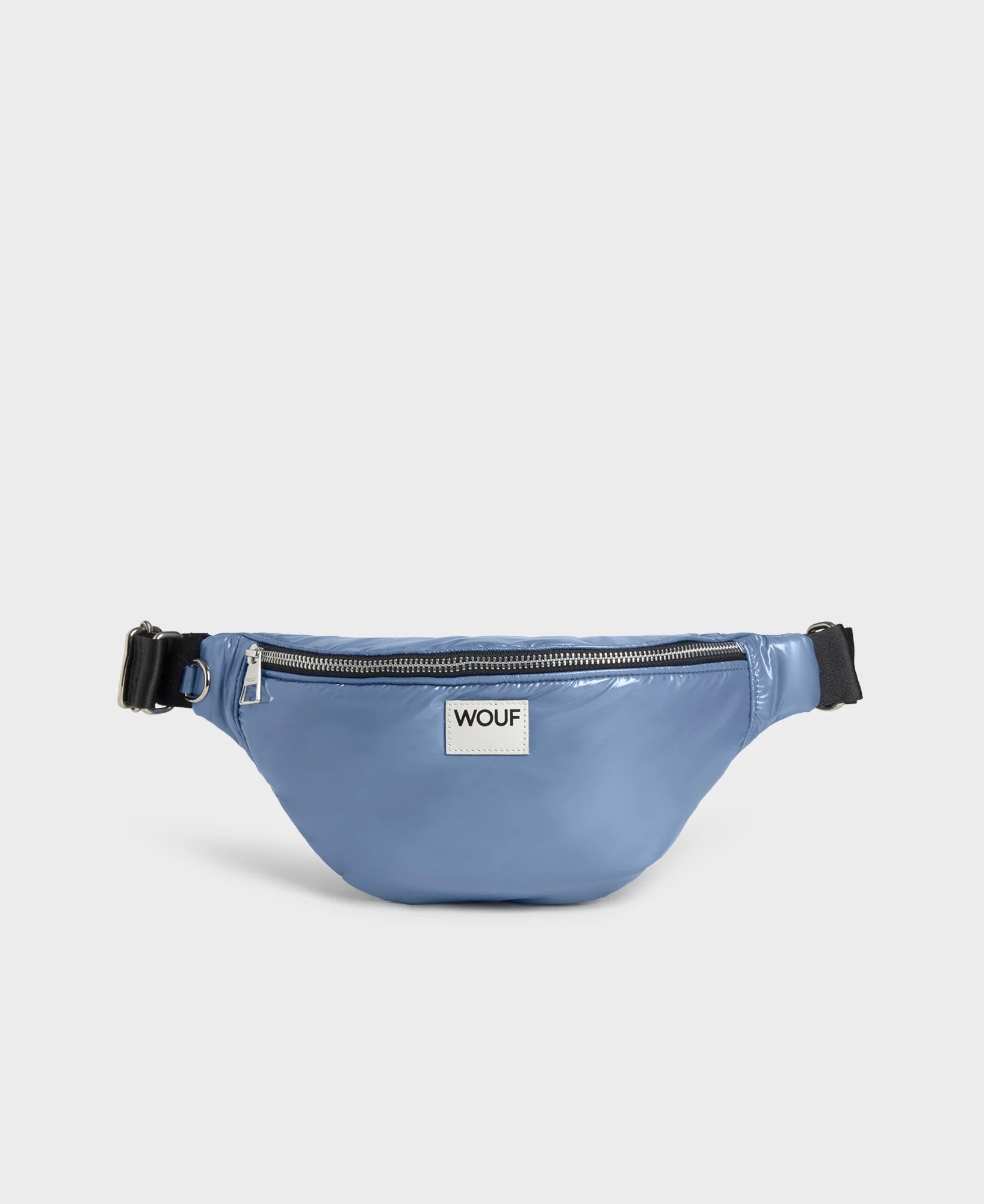 Blue waist bag with a visible brand logo on a light gray background