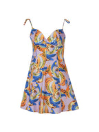 Multicolored patterned dress on a white background