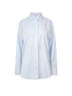 Light blue and white striped shirt on a white background
