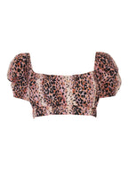 Leopard print top on a white background
