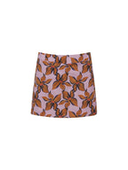 A pink A-line mini skirt with an all-over brown and black floral pattern, shown flat against a plain white background.