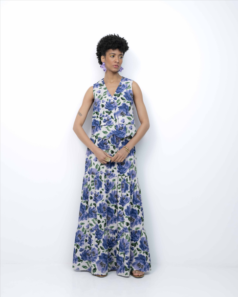 Woman wearing a floral dress on a white background