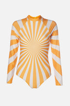 A long-sleeve bodysuit featuring a bold yellow and white sunburst radial pattern, displayed on a clean light gray background.