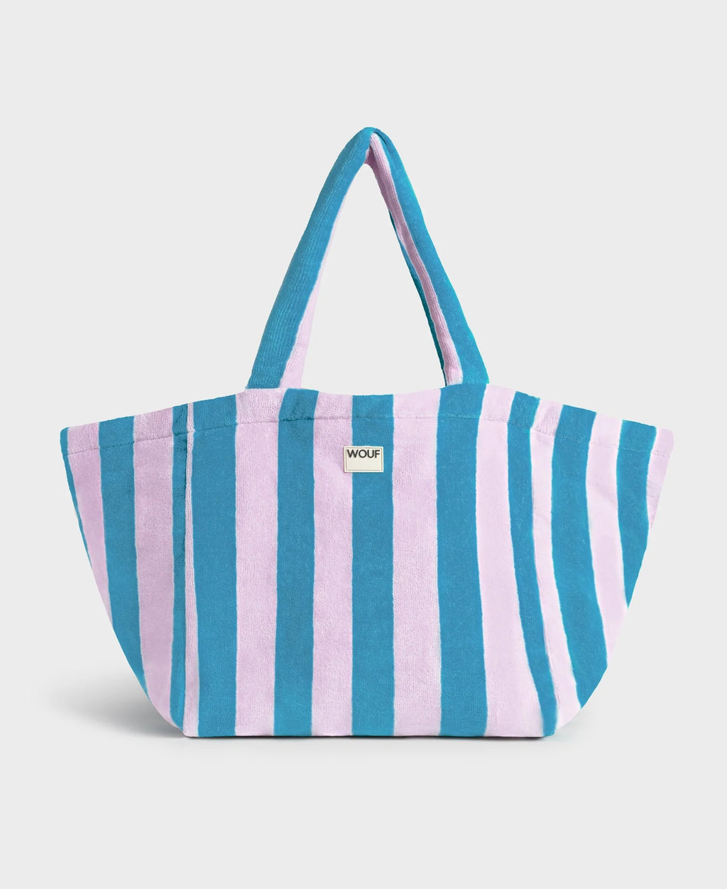Striped tote bag with blue and pink horizontal stripes on a light gray background