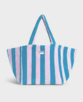Striped tote bag with blue and pink horizontal stripes on a light gray background