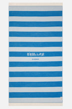 Striped towel with blue and white stripes and text on a white background
