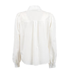 A white long-sleeve blouse shown from the back, featuring a high collar, a gathered back panel with a central seam, and buttoned cuffs, displayed on a clean white background.