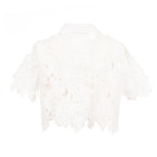 White lace shrug on a white background