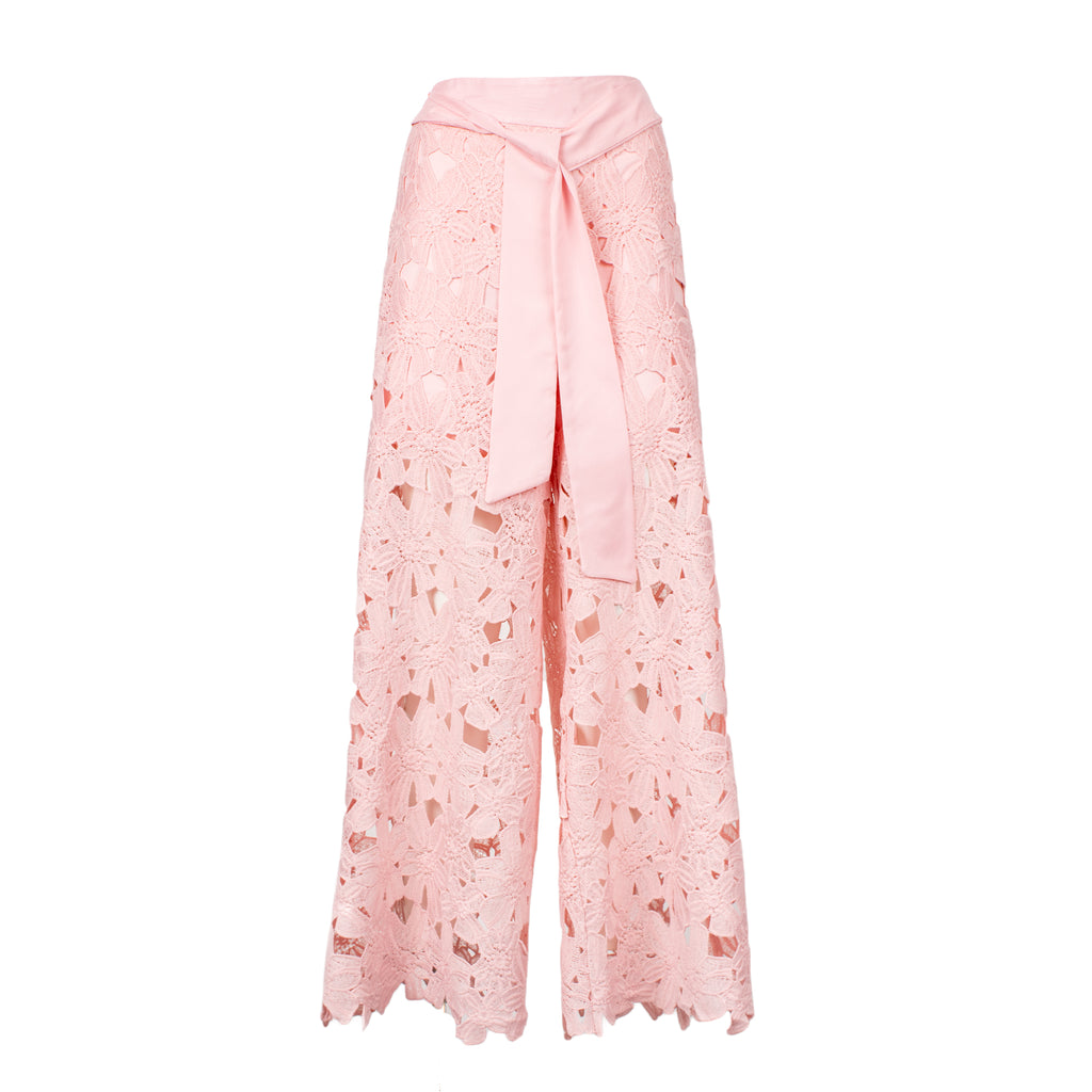 Pink lace pants on a white background