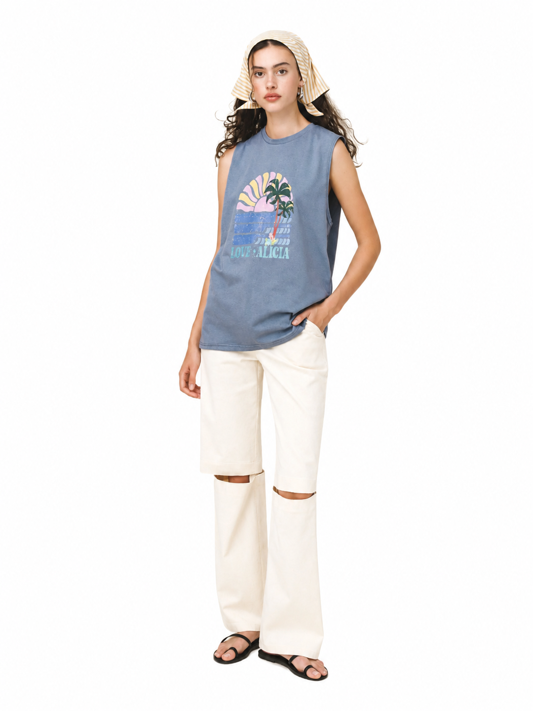 Love and Alicia Rising Sun Tank blue organic cotton muscle tank with retro sunset graphic styled with white wide-leg jeans
