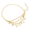 A gold chain anklet featuring multiple dangling safety pin charms and small key-shaped charms, displayed on a clean white background.