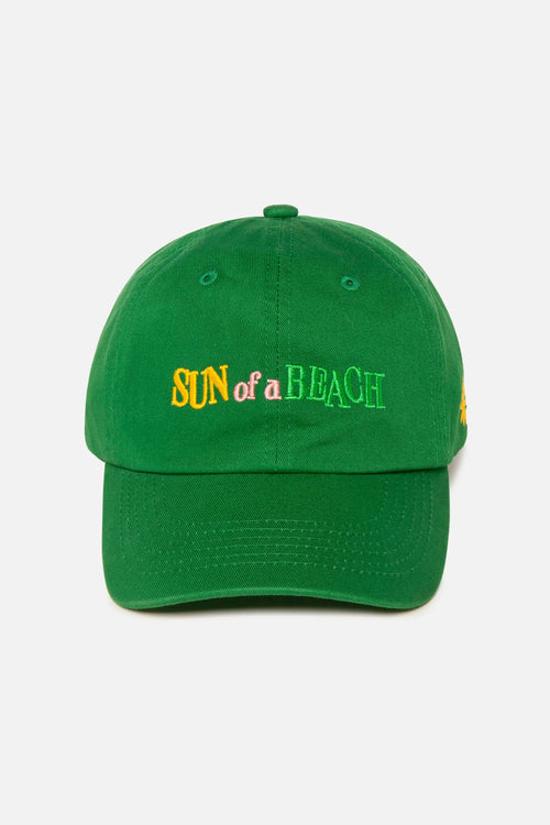Green cap with 'Sun of a Beach' text on a white background