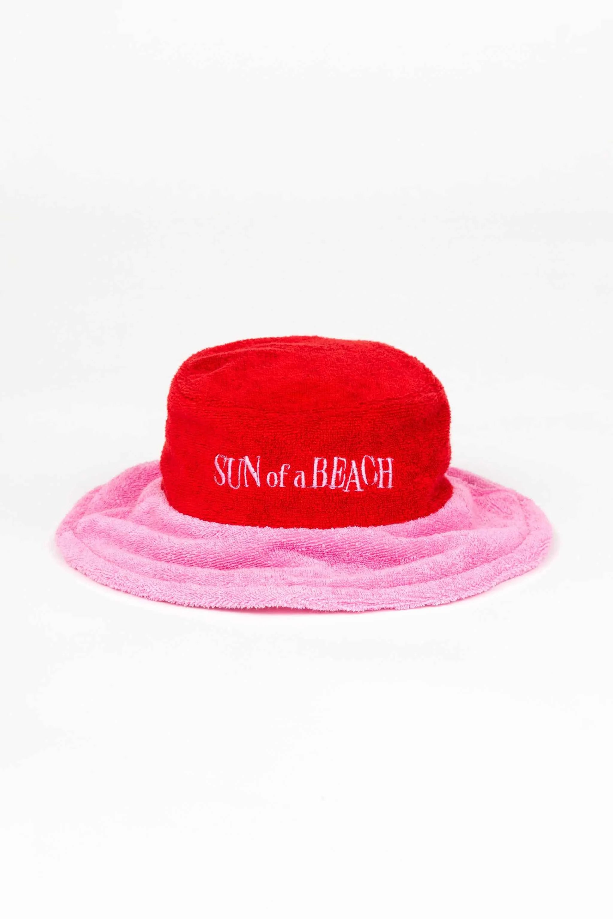 Red and pink bucket hat with 'Sun of a Beach' text on a white background