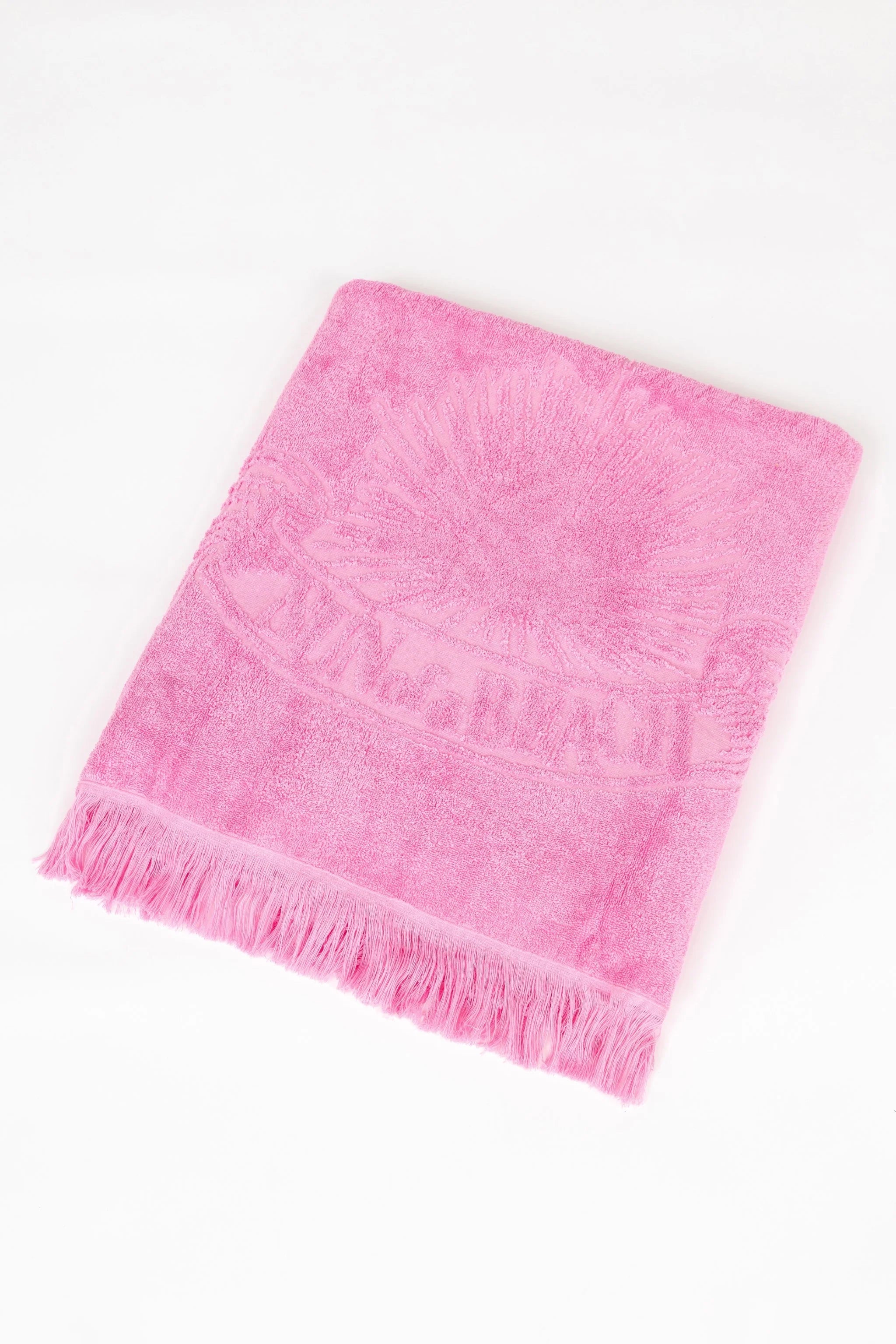 Pink towel with text on a white background