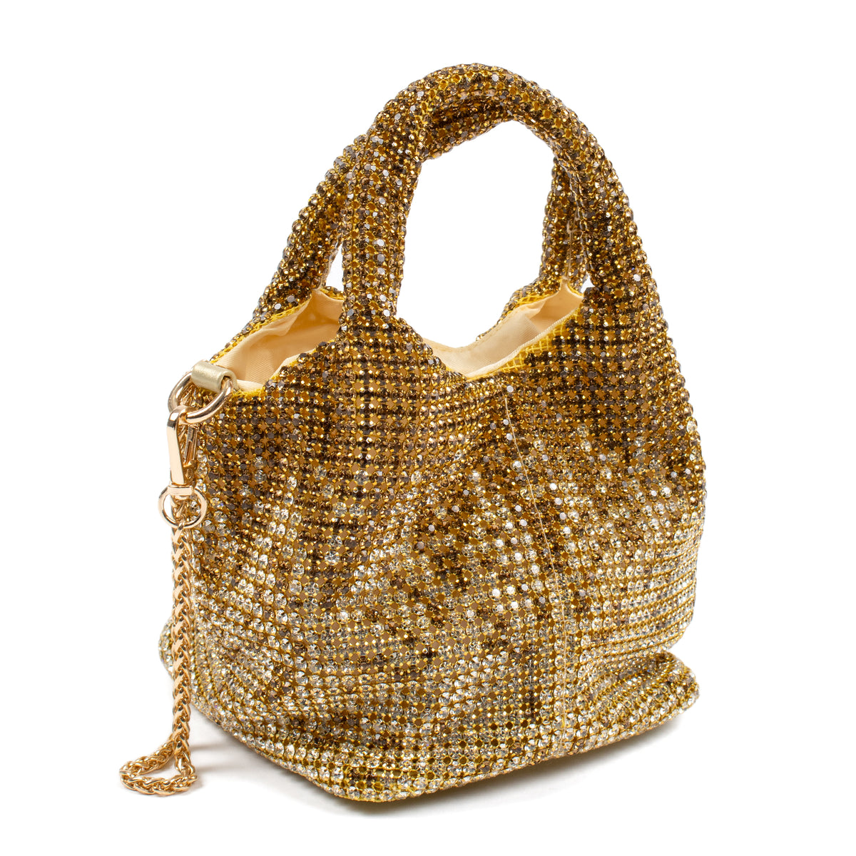 A gold rhinestone-embellished handbag with dual top handles and a matching chain strap, shown on a plain white background.