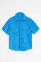 Blue short-sleeve shirt on a white background