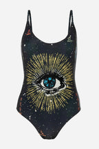 One-piece swimsuit with eye design and celestial pattern on a white background