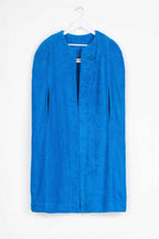 Blue garment cover on a white hanger against a white background