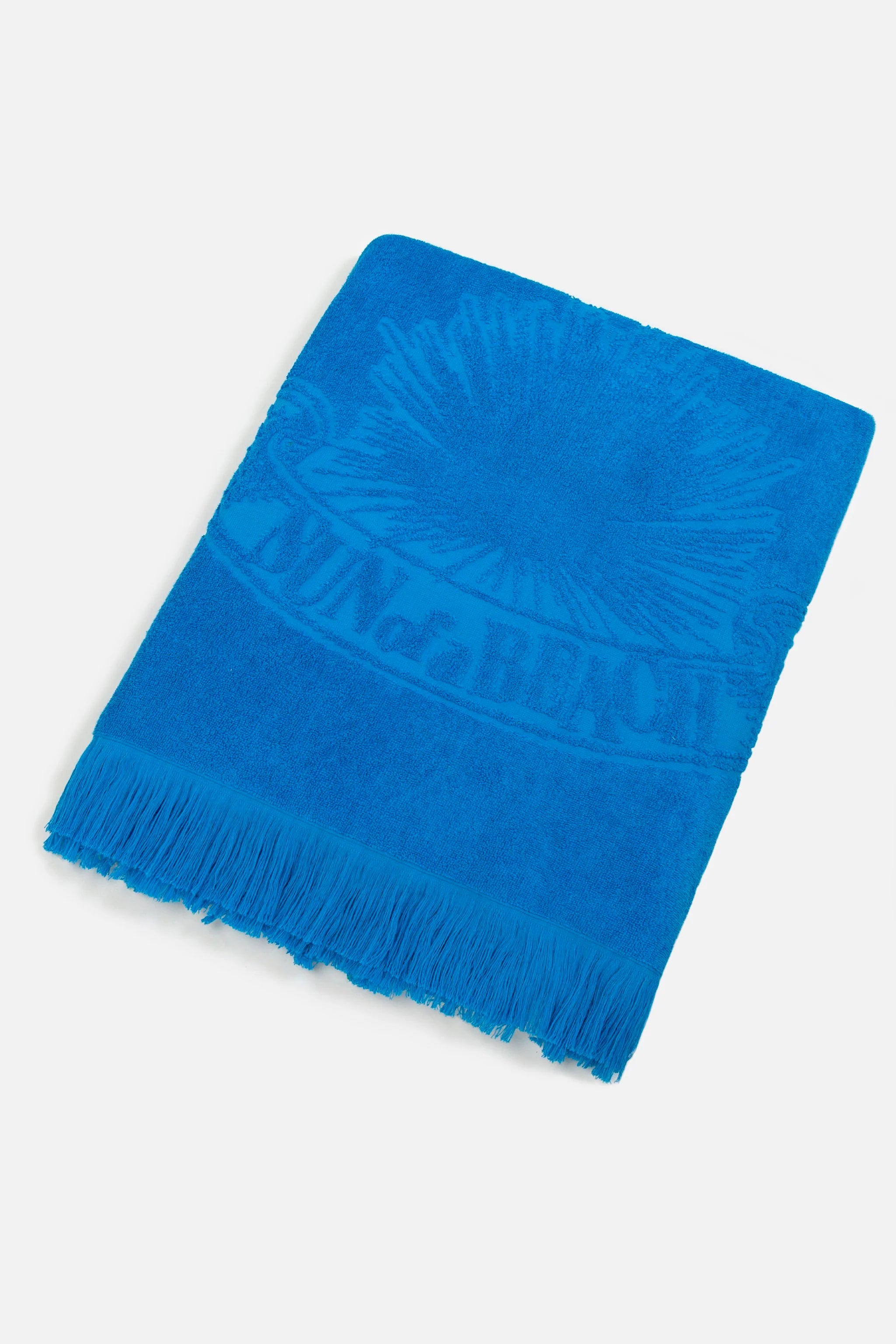 Blue towel with fringes on a white background
