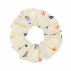 Floral patterned scrunchie on a white background