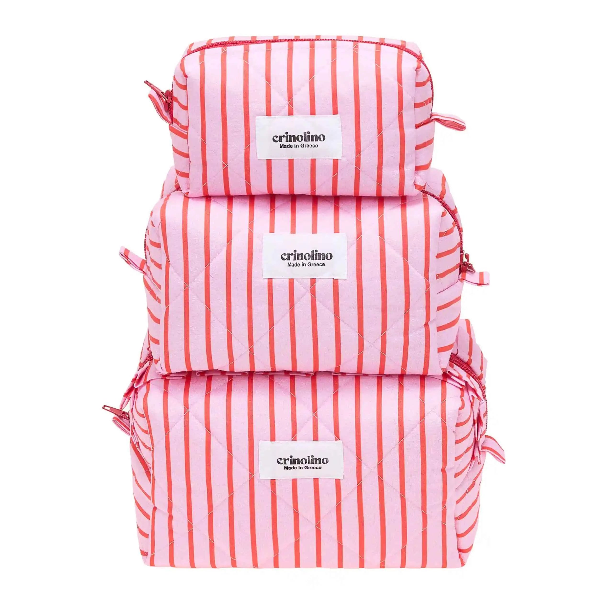 Set of three pink and white striped bags with 'crinolino' labels on a white background
