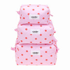 Pink polka dot backpacks with 'crinolino' label on a white background