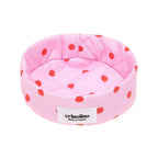Pink polka dot chair with 'crinolino' label on a white background