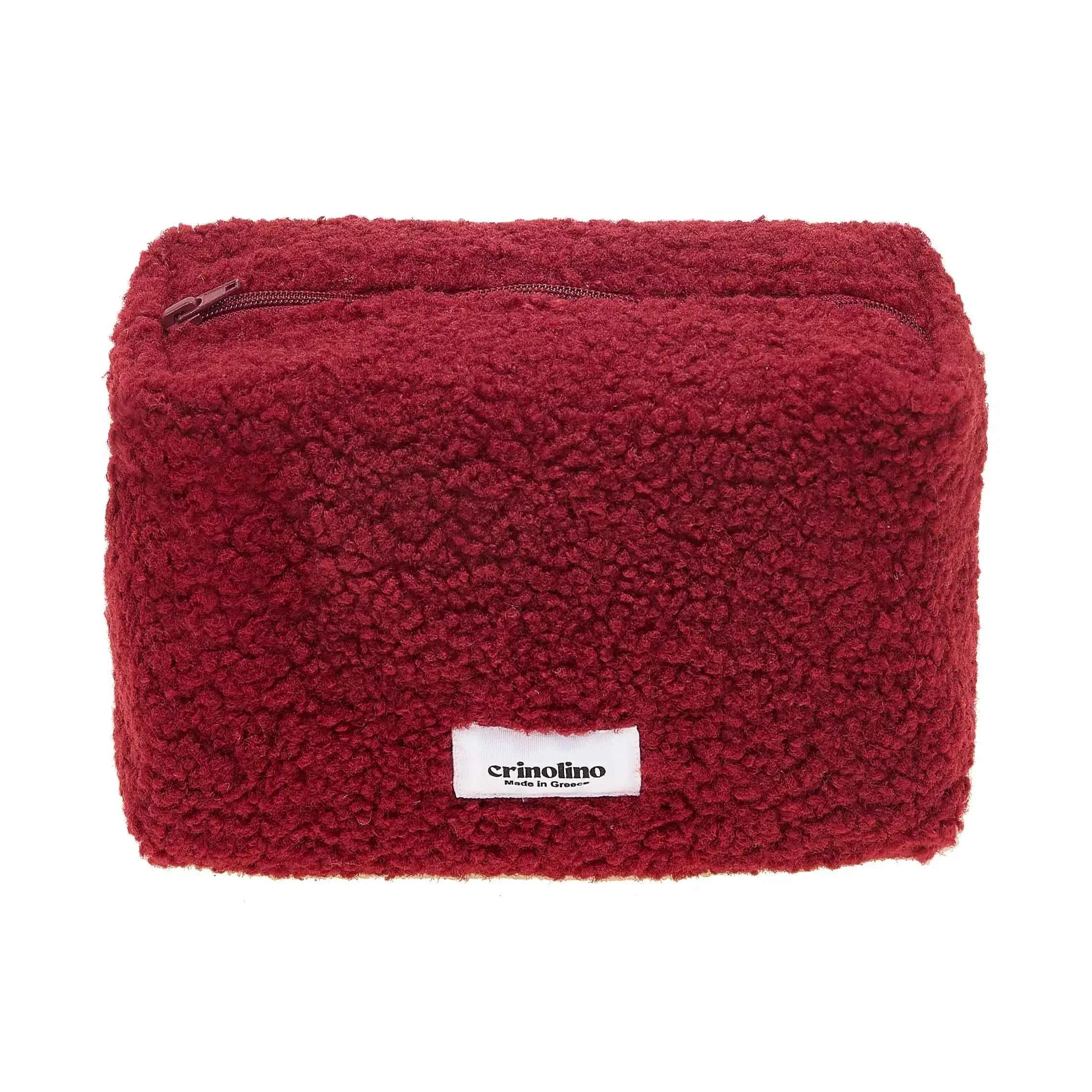 Red textured pouch with a visible brand label on a white background
