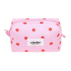 Pink pouch with red polka dots and 'crinolino' brand label on a white background