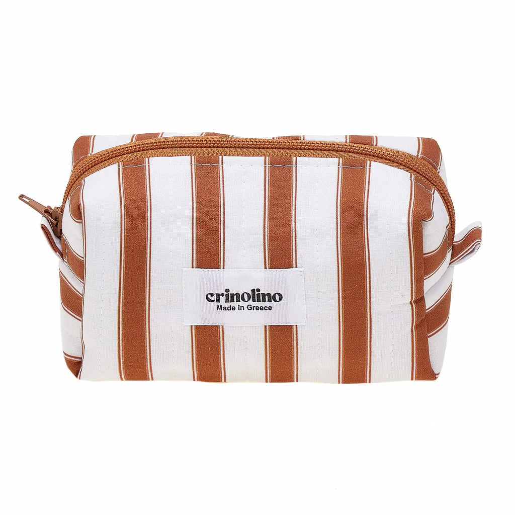 Striped toiletry bag with 'crinolino' brand label on a white background