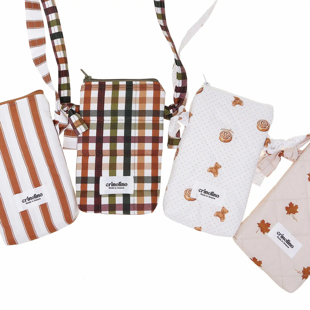 Collection of small bags with different patterns and designs on a white background