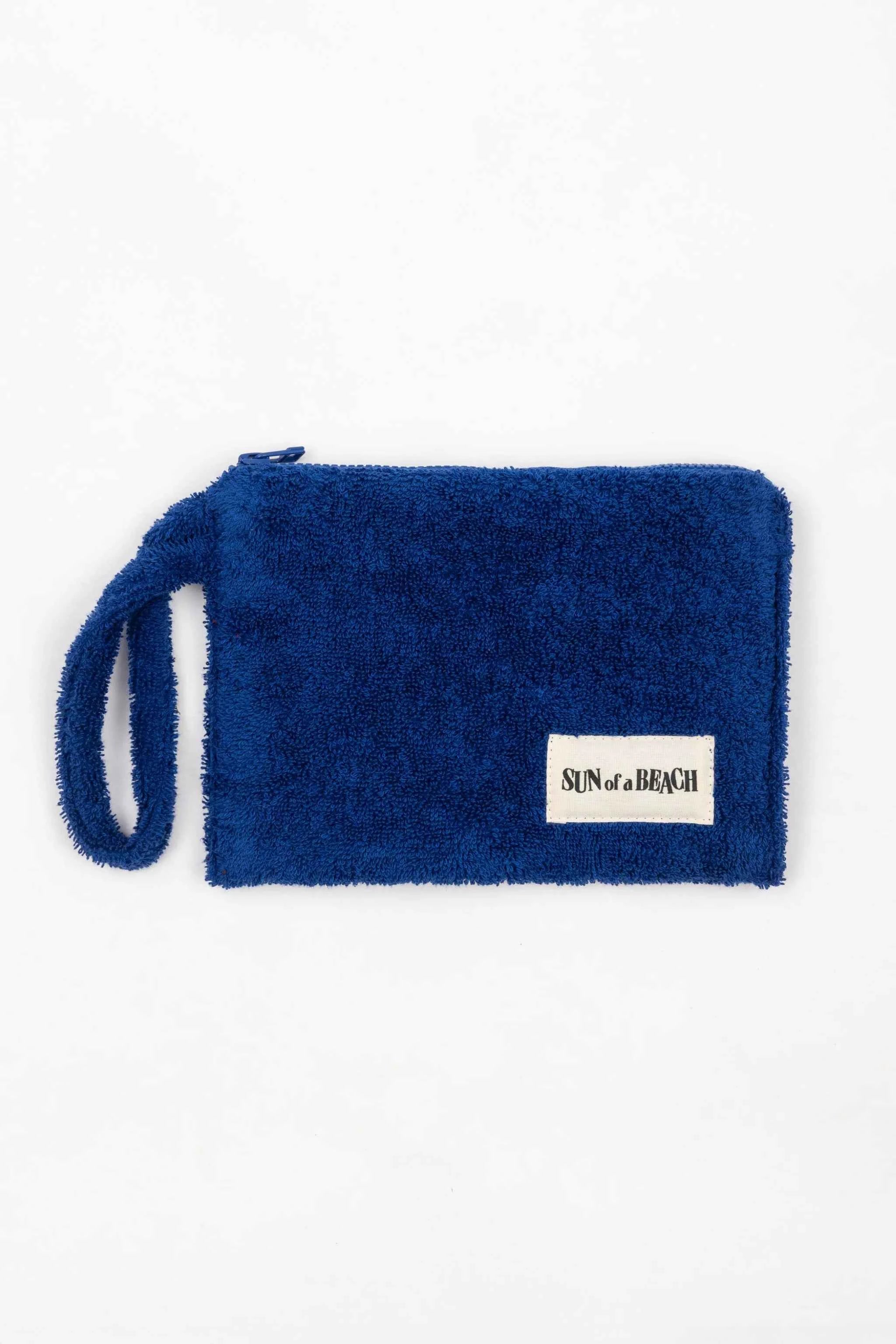 Blue fluffy pouch with a brand label on a white background