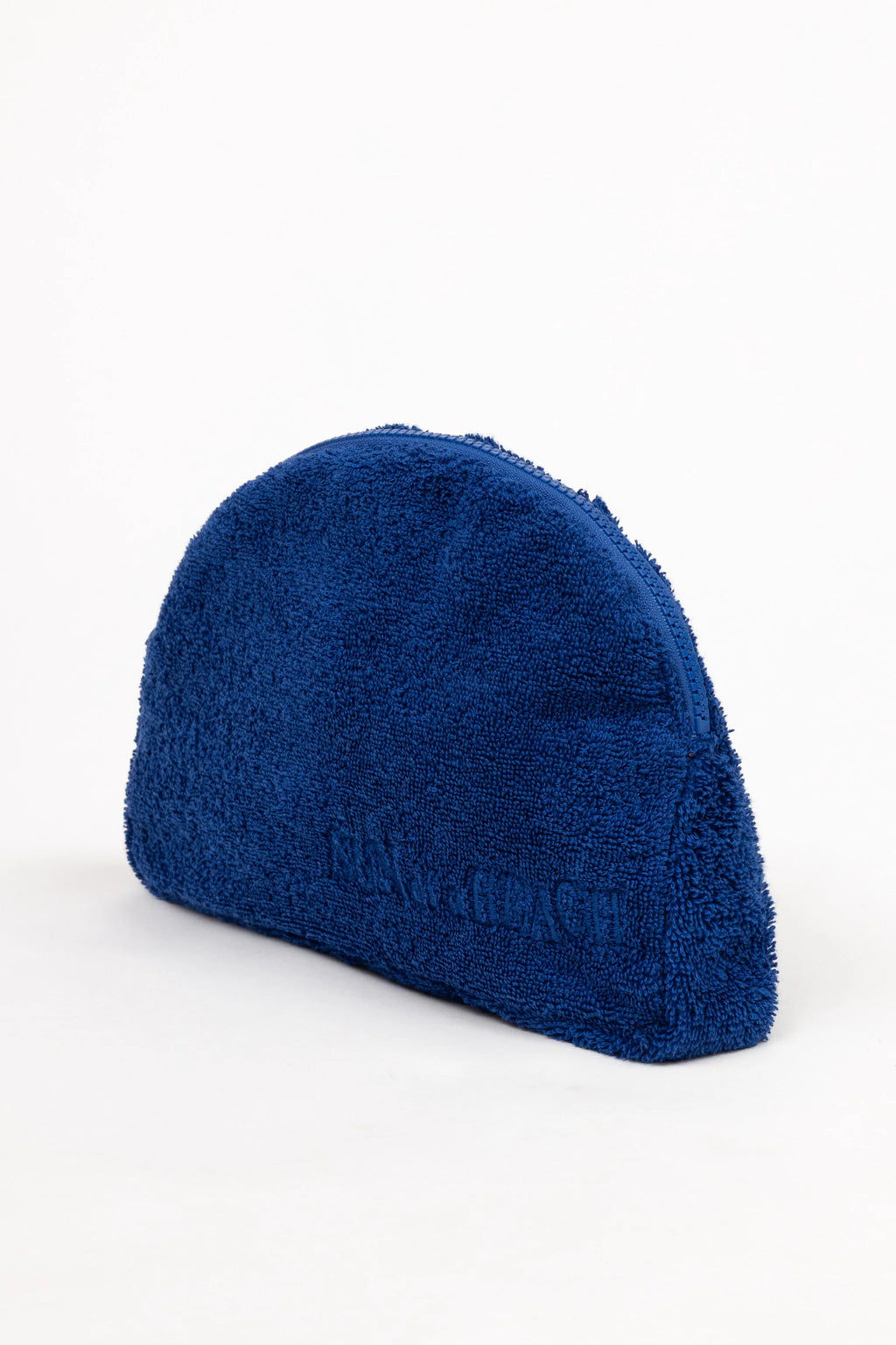 Blue fuzzy beanie on a white background