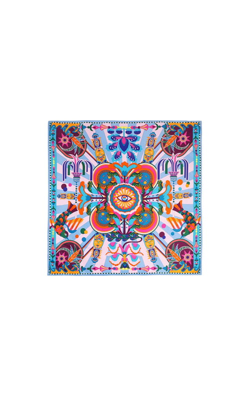 Colorful patterned fabric square on a white background