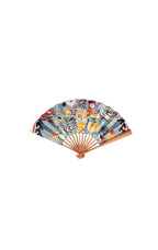 Colorful hand fan with floral and animal design on a white background