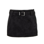 A black suede mini skirt with a matching black belt and a silver buckle, shown against a plain white background.