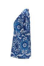 Blue and white floral patterned shirt on a white background