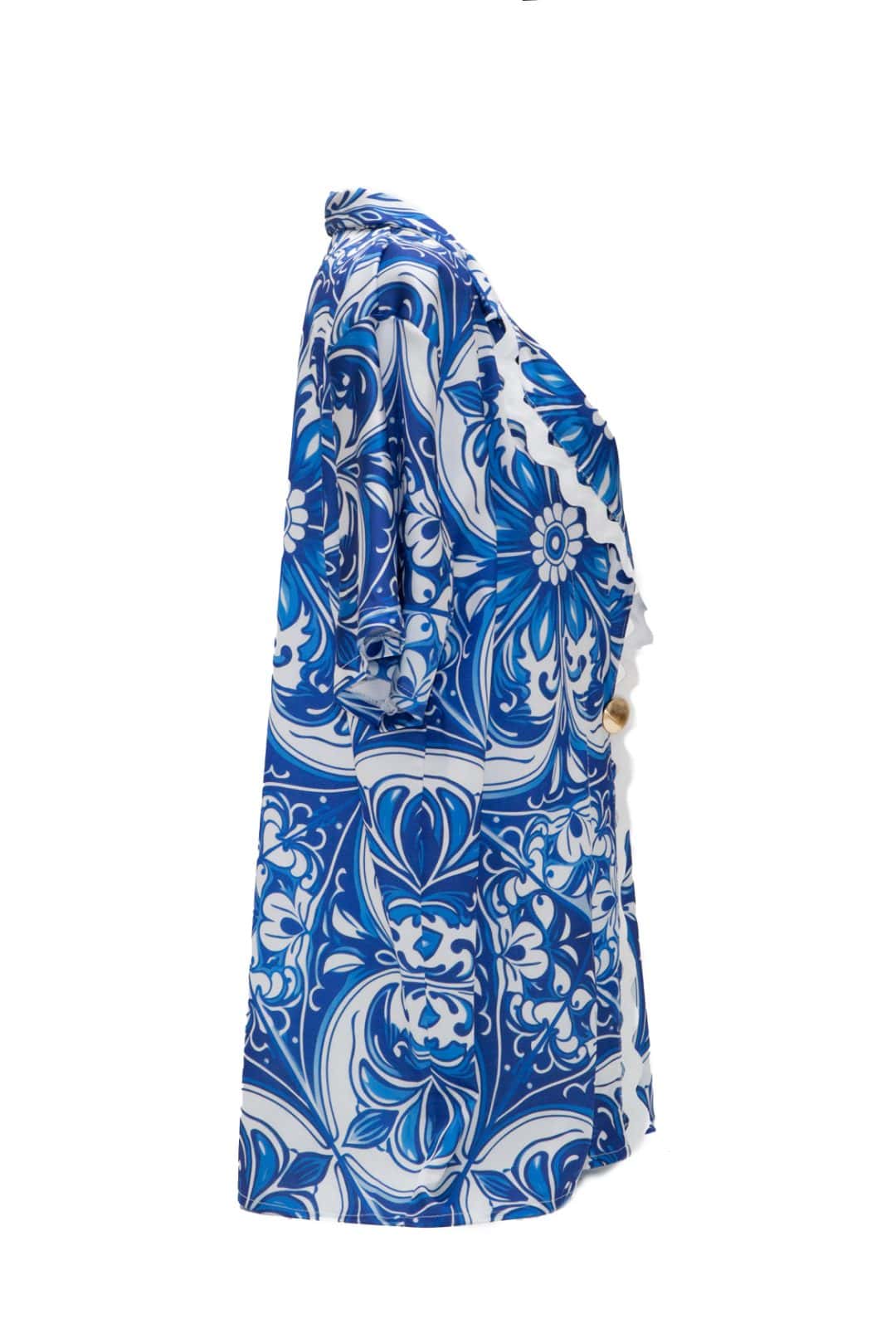 Blue and white patterned dress on a white background