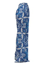 Blue and white patterned pants on a white background
