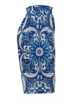 Blue and white patterned skirt on a white background