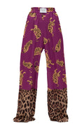 Purple pants with gold tiger pattern and leopard print at the bottom on a white background