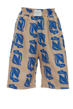 Beige pants with blue pattern on a white background