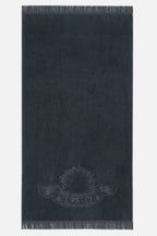Black towel with a logo on a white background