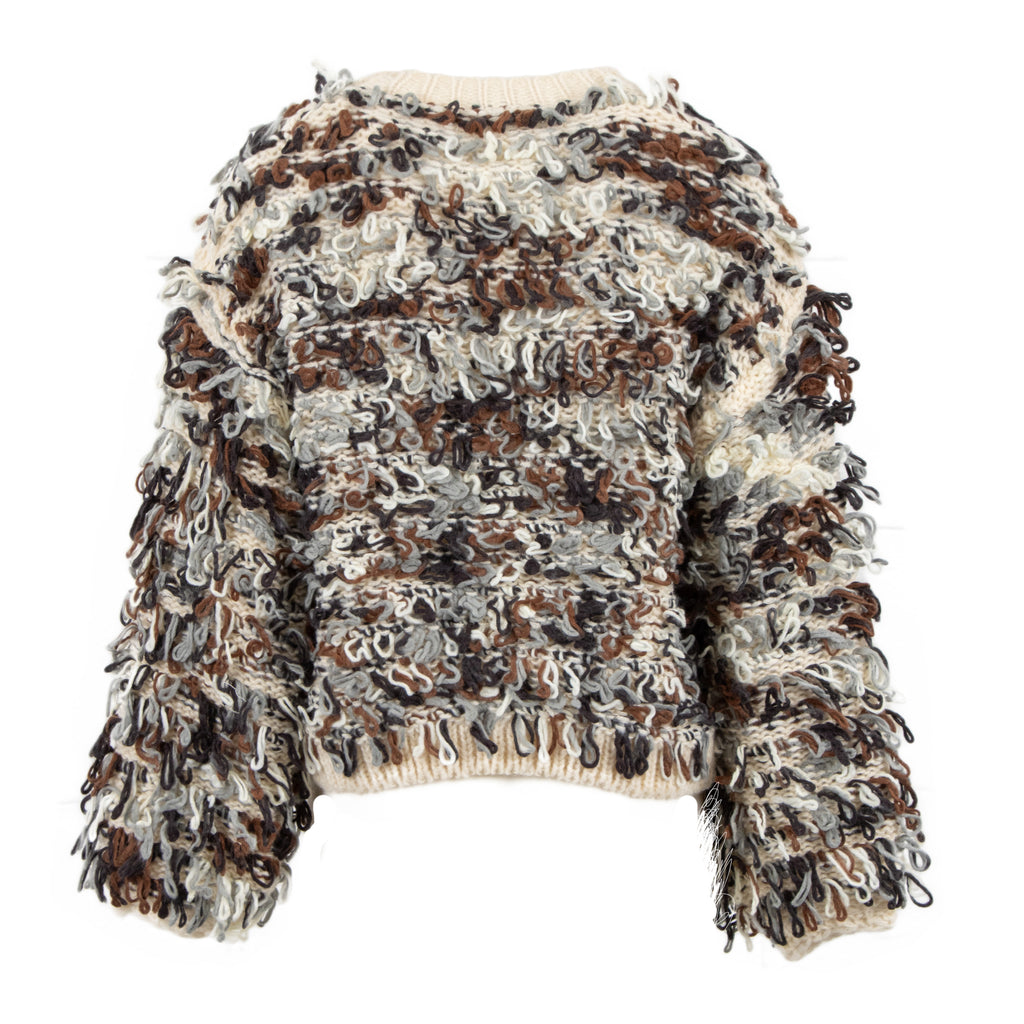 A cropped, long-sleeve knit sweater with a chunky, shaggy tangle texture in a marled mix of cream, brown, black, and gray, shown against a plain white background.