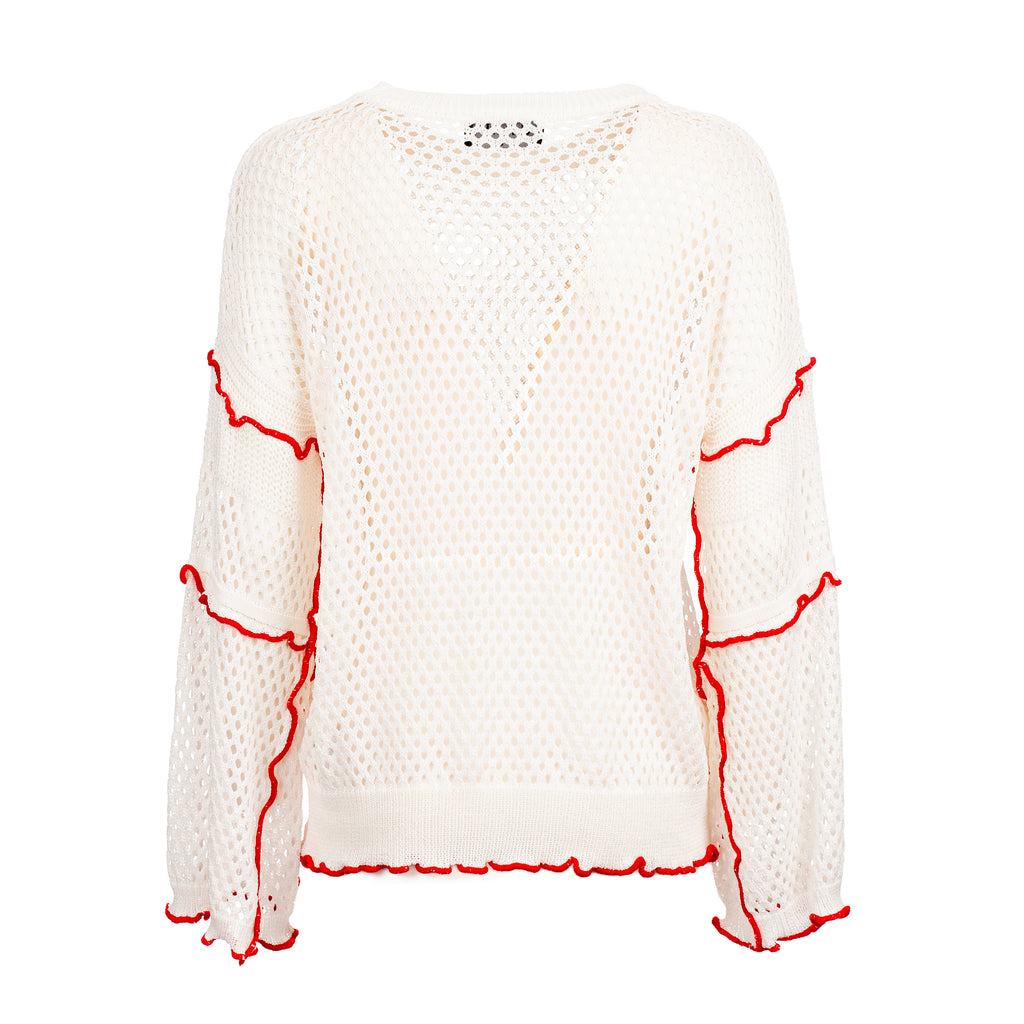 White sweater with red accents on a white background