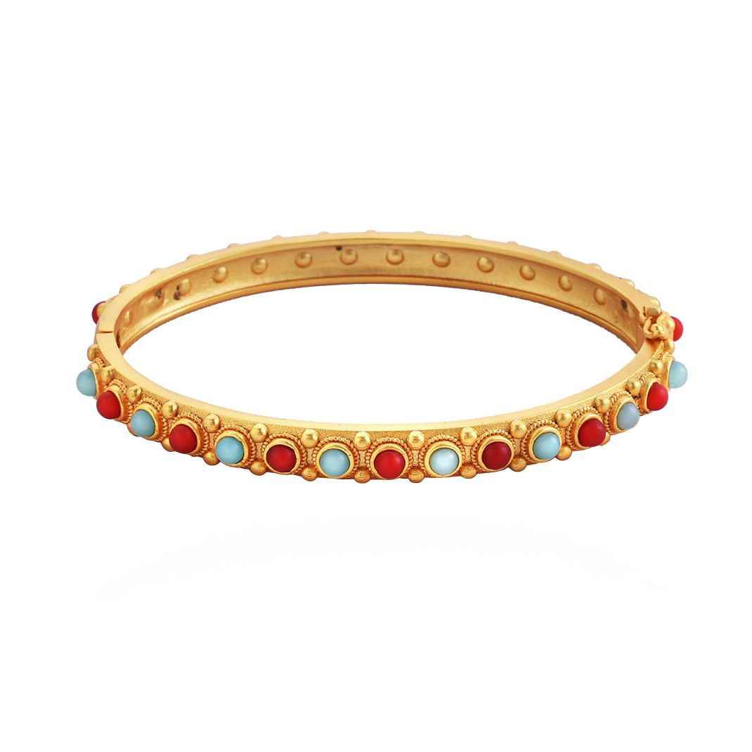 Gold bracelet with colorful gemstones on a white background