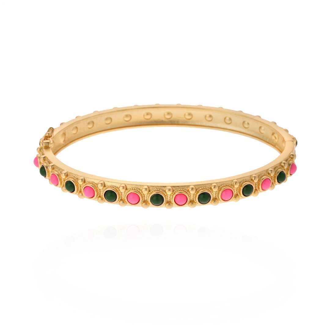 Gold bracelet with colorful stones on a white background