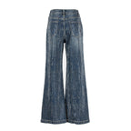A pair of high-waisted, wide-leg jeans in a textured blue denim wash, shown from the back on a plain white background.