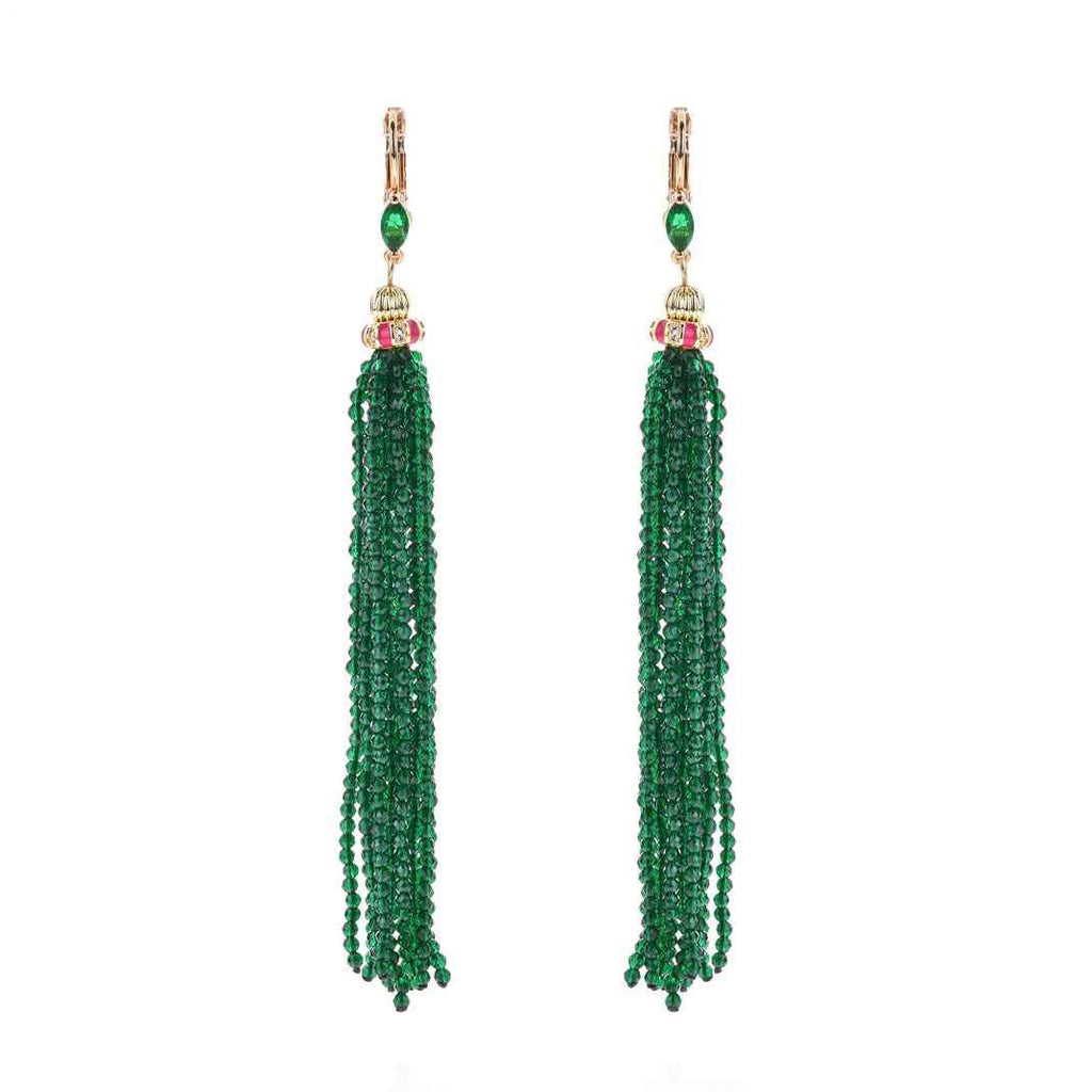 Pair of green beaded tassel earrings on a white background